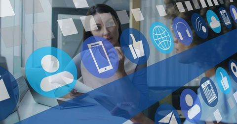 Businesswomen Discussing Social Media Strategy Reviewing Analytics and Digital Branding