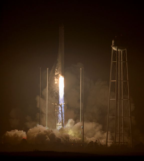 Orbital ATK's Antares rocket launching the Cygnus spacecraft carrying over 5,100 pounds of supplies to the ISS on October 17, 2016, from Pad-0A at NASA's Wallops Flight Facility, Virginia. Ideal for use in articles and multimedia related to space missions, rocket launches, scientific research, and NASA's space explorations.