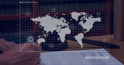 Overlaying world map over gavel and contract signing representing global legal agreements