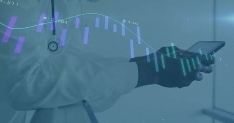 Doctor using smartphone with digital charts in healthcare environment