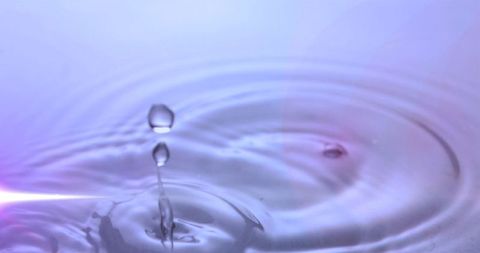 Serene droplet formation with elegantly radiating ripples