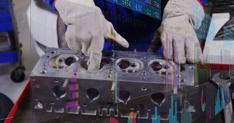 Mechanic inspecting cylinder head with augmented data overlay for predictive diagnostics