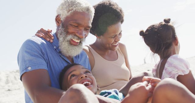 Happy Multigenerational Family Enjoying Fun Day at Beach - Download Free Stock Images Pikwizard.com