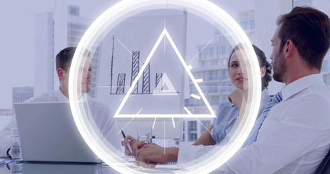 Business Team Engaged in Strategic Planning with Futuristic Overlay