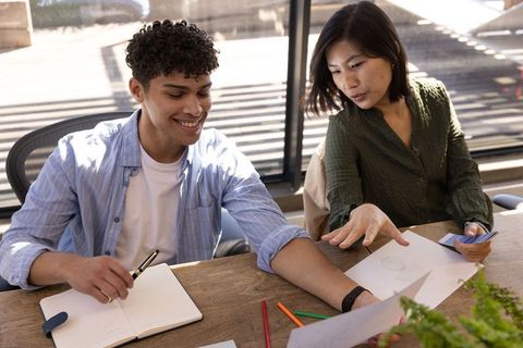 Team Brainstorming for Innovative Solutions in Modern Office