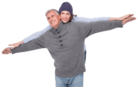 Carefree senior couple embracing joyful winter scene