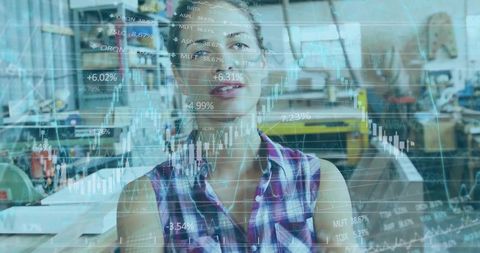 Standing female machinist explaining workshop workflow with augmented reality market charts