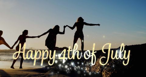 Silhouette of Friends Celebrating Fourth of July at Beach Sunset - Download Free Stock Images Pikwizard.com