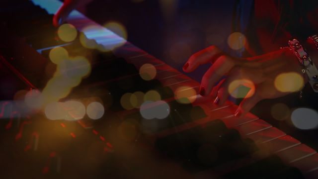 This video showcases hands playing a keyboard with an artistic overlay of blurred city lights and bokeh, creating a vibrant and energetic atmosphere. Ideal for use in promotional materials for music events, nightlife, live performances, concerts, or urban lifestyle content. Perfect for music-related blogs, social media posts, or event advertisements.