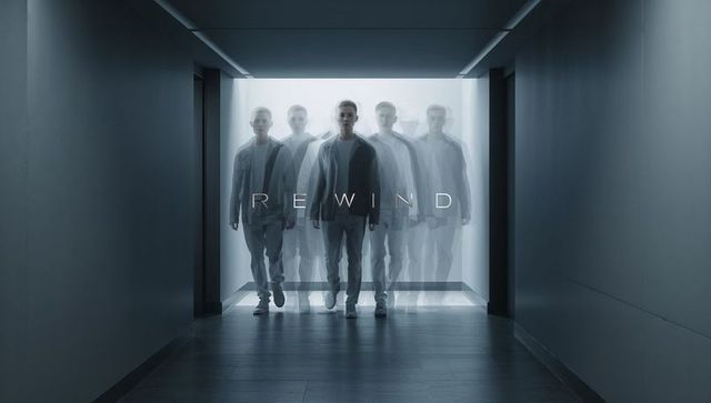 Rewind afterimage: walking man repeating in futuristic backlit corridor with ghosting effect