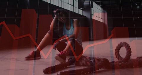 Exhausted athlete regaining strength after intense workout