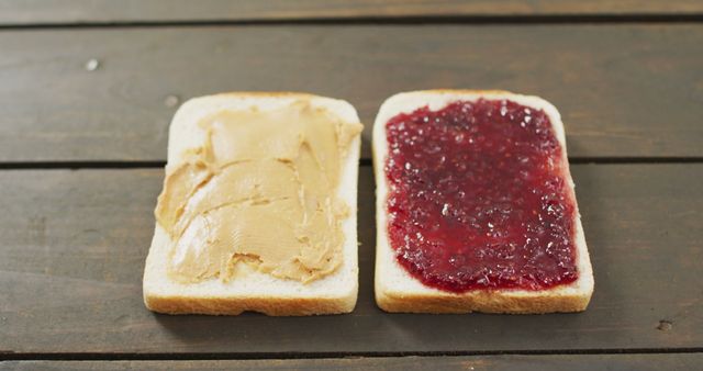 Close up view of peanut butter and jelly sandwich with copy space on wooden surface. food and nutrition concept