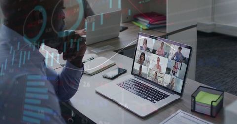Male Professional in Virtual Meeting with Financial Data Overlay
