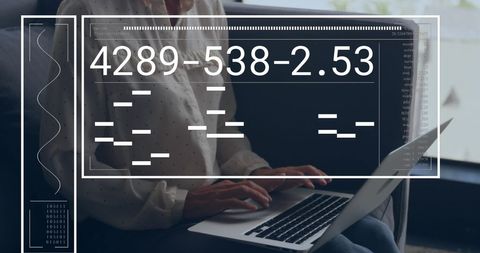 Businesswoman Analyzing Data Interface on Laptop Screen