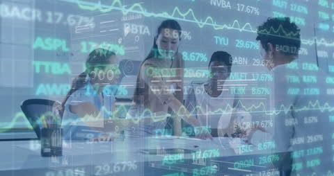 Business Team Collaborating with Financial Data Analytics Interface