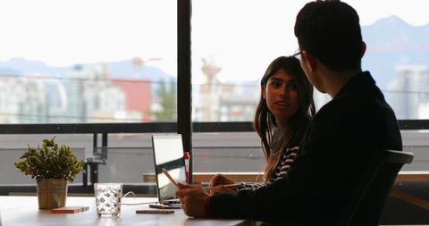 Young Professionals Collaborating in Modern Office with City Views - Download Free Stock Images Pikwizard.com