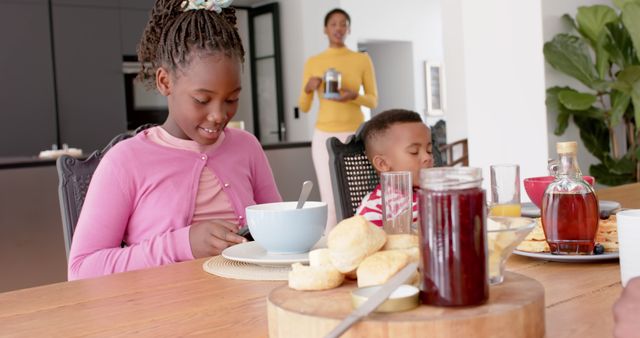 Family Enjoying Breakfast at Home with Fresh Homemade Biscuits - Download Free Stock Images Pikwizard.com