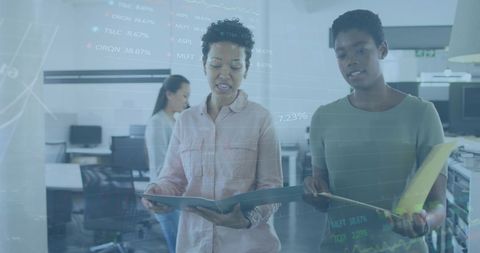 Business Professionals Collaborating with Stock Market Overlay