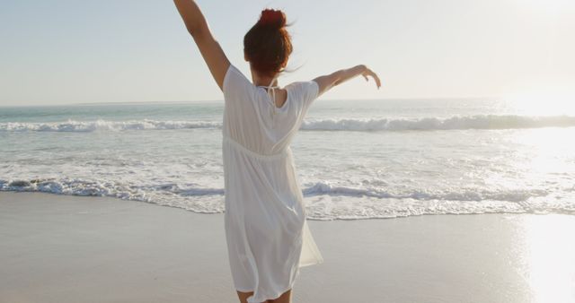 Carefree Woman Enjoying Sunset on Sandy Beach - Download Free Stock Images Pikwizard.com