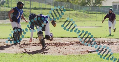 Female softball match catcher grabbing ball infield