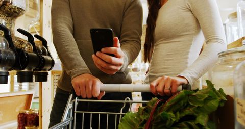 Couple Shopping for Groceries in Organic Supermarket