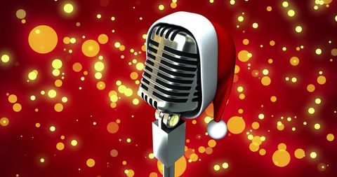 Vintage microphone adorned with santa hat for festive season