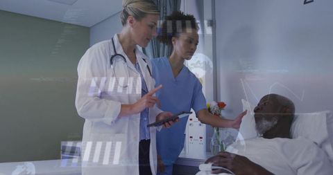 Doctor explaining care plan at bedside while nurse supporting patient using tablet