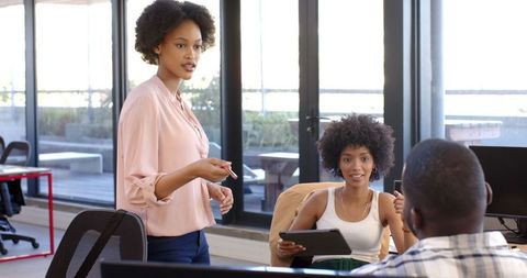 Dynamic Team Meeting in Bright Modern Office