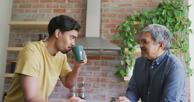 Father and Son Spending Time Together in Kitchen - Download Free Stock Images Pikwizard.com