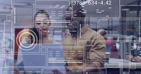 Diverse Business Team Analyzing Data in Modern Office Workspace