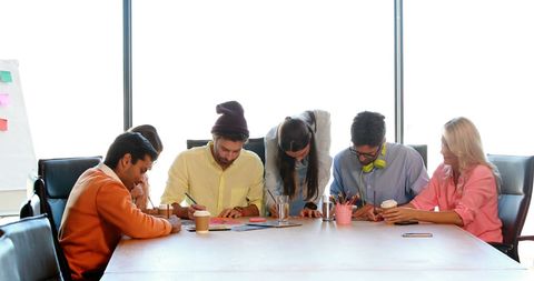 Business Team Collaborating on Creative Project in Conference Room - Download Free Stock Images Pikwizard.com