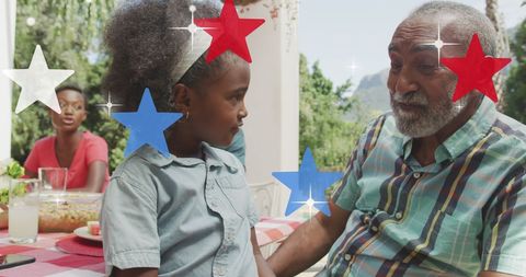 Grandfather and Granddaughter Celebrating Independence Day with Patriotic Stars - Download Free Stock Images Pikwizard.com