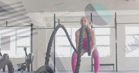 Woman Intense Cross Training with Battle Ropes in Gym - Download Free Stock Images Pikwizard.com
