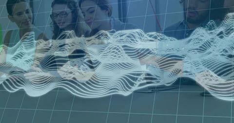 Professional Team Analyzing Holographic Data on Tablet in High-Tech Meeting