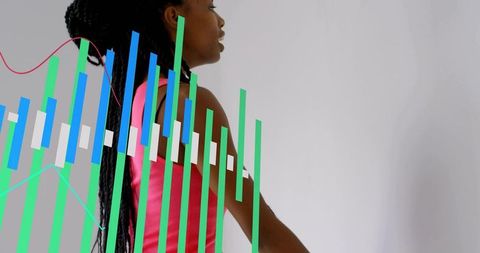 Woman in bright pink sleeveless top standing with data visualization overlay