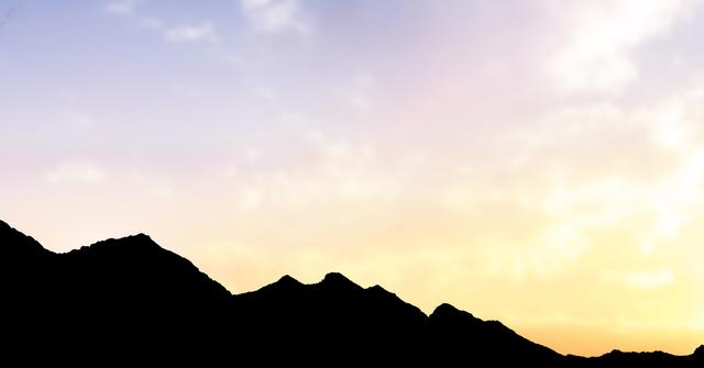 Digital composite of Silhouette mountains against sky during sunset