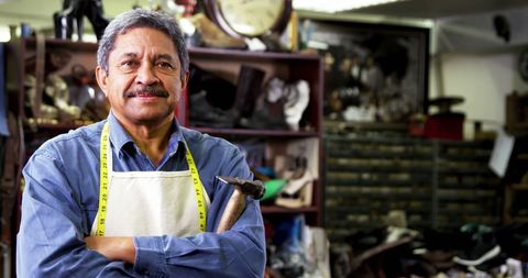 Portrait of Skilled Shoemaker in Traditional Workshop - Download Free Stock Images Pikwizard.com