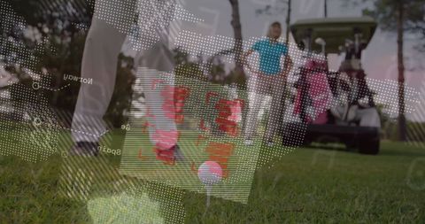 Preparing to hit golf ball on lush fairway background