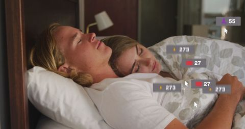 Couple sleeping with social media notifications overlay