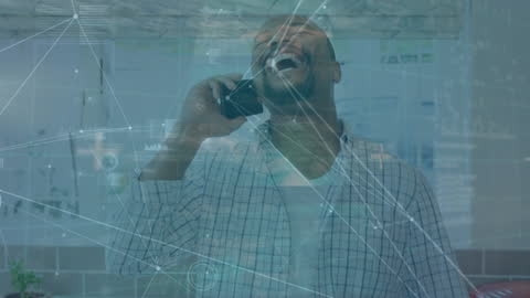 Man Enthusiastically Talking on Phone with Digital Overlay