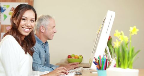 Diverse Team Smiling While Collaborating in Modern Workspace - Download Free Stock Images Pikwizard.com
