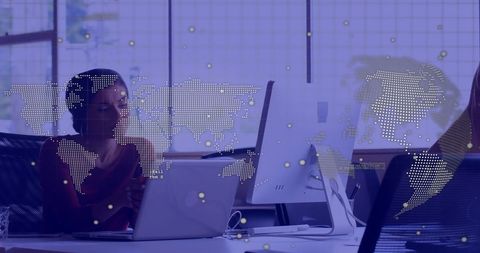 Businesswoman Analyzing Global Data on Laptop With Holographic Map