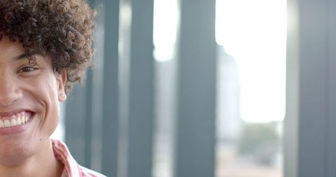 Cheerful person smiling creatively with text space