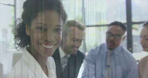 Smiling Business Team Analyzing Financial Data Overlay