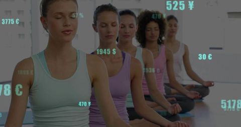 Group Meditating Practicing Mindfulness and Breathwork in Yoga Studio Wearing Pastel Activewear