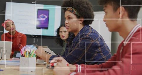 Diverse Team in Modern Office Sharing Ideas During Meeting