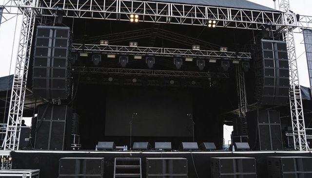 Outdoor Concert Stage With Large PA Speakers, Truss Rigging, LED Screen, Lighting Grid