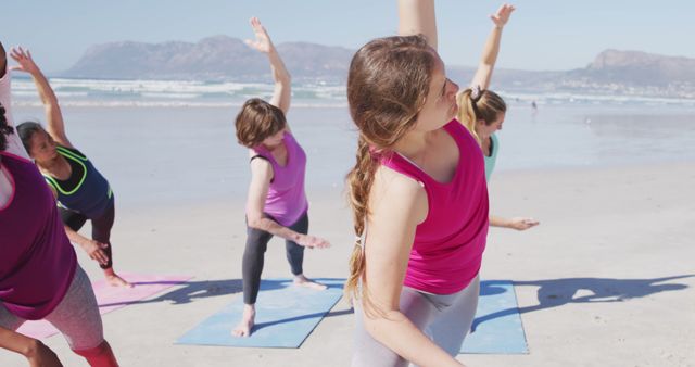 Group of Women Practicing Yoga on Beach in Sunny Weather - Download Free Stock Images Pikwizard.com