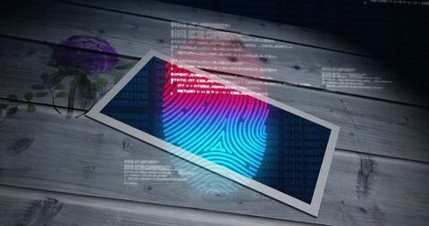 Projecting neon biometric fingerprint onto wooden tabletop with code overlay and purple rose