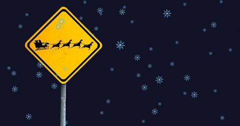 Christmas road sign with falling snowflakes on dark background